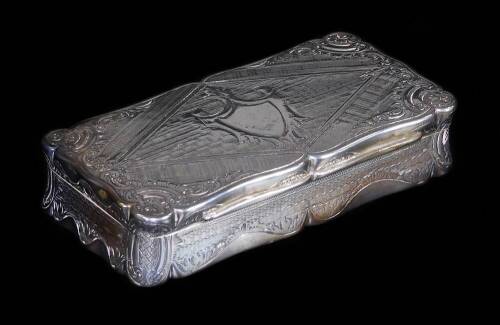 An early 19thC snuff box, of shaped rectangular form, with chased scroll and geometric decoration, with vacant central shield cartouche, with plain interior and engine turned base raised with further scrolls and ovals, initialled P to the lid, continental