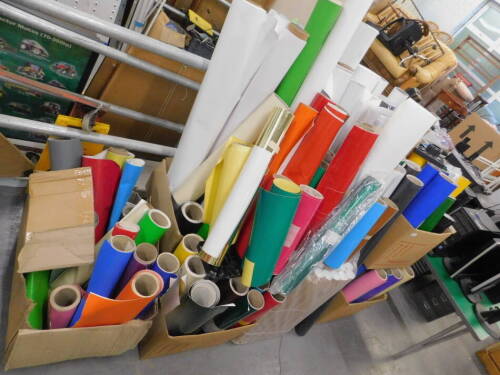 A quantity of stock vinyl rolls, various coloured vinyls, gloss, matte, laminate rolls, etc., (a quantity).