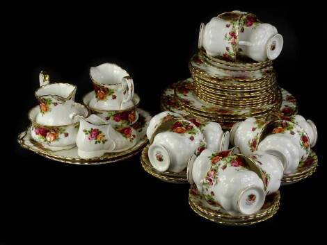 A Royal Albert Old Country Roses pattern part dinner and tea service, to include large dinner plates, cake plates, novelty shoe, etc.