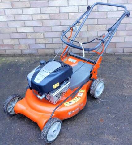 A Husqvarna LB 155S petrol rotary lawnmower, lacking grass collector.