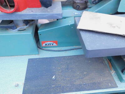 A Kity electric circular saw, and bench with some accessories. - 2