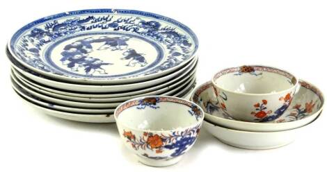 A collection of 19thC Chinese blue and white plates, each decorated with children, other similar plates, and two Imari tea bowls and saucers. (AF)