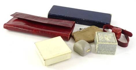 Various empty jewellery boxes and leather wrap cases.