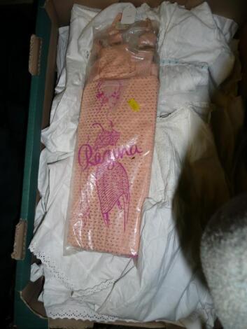 A box of vintage baby nightgowns plus 50's packaged pink corset