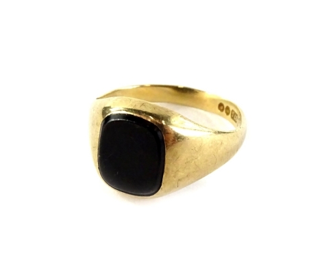 A 9ct gold signet ring, of plain design set with rectangular shield to centre, formed of black agate, the ring size P½, 2.8g all in.