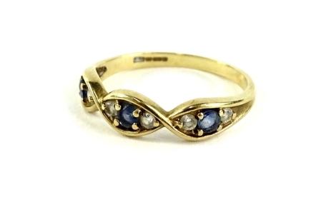 A 9ct gold dress ring, set with three sections each set with single sapphire, flanked by two diamonds, ring size P, 1.9g all in.