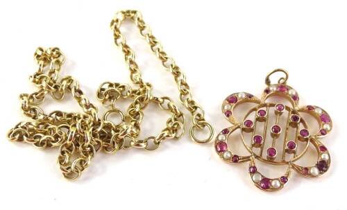 A pendant and chain, the pendant set with pink topaz and seed pearl in floral cluster, in yellow metal back, unmarked, 2.5cm W, on a modern curb link 9ct gold chain, the chain overall 9.9g, 42cm L. (2)