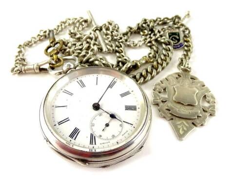 A silver pocket watch, with makers stamp K & Co Limited, Birmingham assay, with white enamel dial, blue hands seconds dial, key wind, with Swiss movement numbered 46596, on a silver watch chain, with sterling silver Feb 20 March 20 shield fob, a T bar and