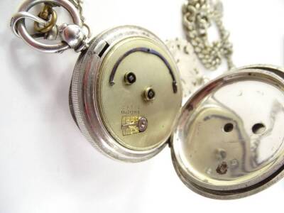 A silver pocket watch, with makers stamp K & Co Limited, Birmingham assay, with white enamel dial, blue hands seconds dial, key wind, with Swiss movement numbered 46596, on a silver watch chain, with sterling silver Feb 20 March 20 shield fob, a T bar and - 2