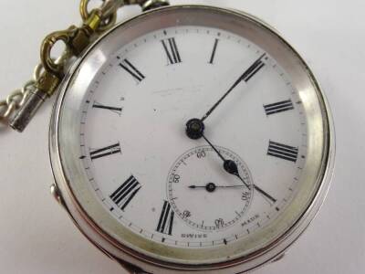 A silver pocket watch, with makers stamp K & Co Limited, Birmingham assay, with white enamel dial, blue hands seconds dial, key wind, with Swiss movement numbered 46596, on a silver watch chain, with sterling silver Feb 20 March 20 shield fob, a T bar and - 3