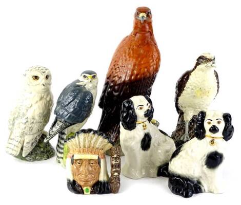 A collection of Beswick and Royal Doulton etc., to include a golden eagle decanter, an osprey flask modelled by D Lyttleton for Royal Doulton, similar owl modelled by John Tongue, a Merlin and a pair of Beswick spaniels etc.