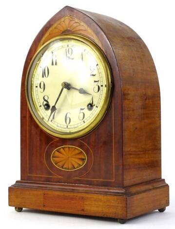 An Edwardian mahogany and marquetry lancet shaped mantel clock, the paper dial stamped Made In The United States of America, on bun feet, previously with presentation and plaque, 32cm H.