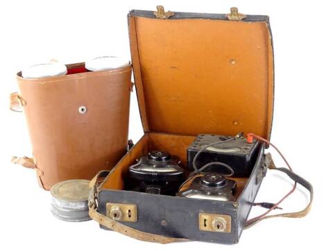 A collection of scientific items, to include amp meters, binoculars, etc.