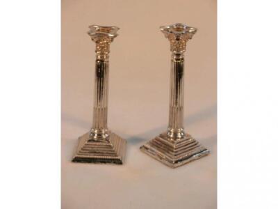 A pair of George V silver composite column table candlesticks