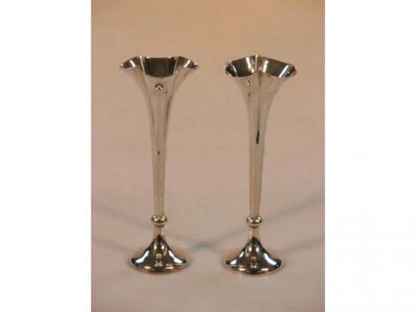 A pair of late Victorian silver specimen vases