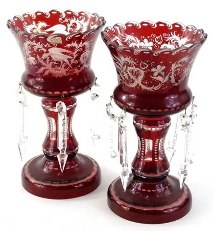 A pair of ruby flash table lustre's, each with engraved decoration of birds, scrolls, leaves, etc., 26cm H.