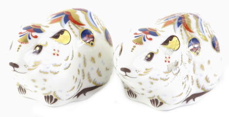 A pair of Royal Crown Derby porcelain Bank Vole paperweights, gold buttons to underside.