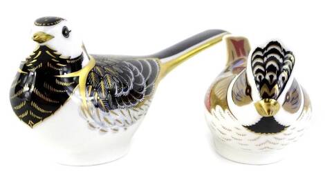 Two Royal Crown Derby porcelain birds, to include Pied Wagtail, the other bird with a faceted gold button.