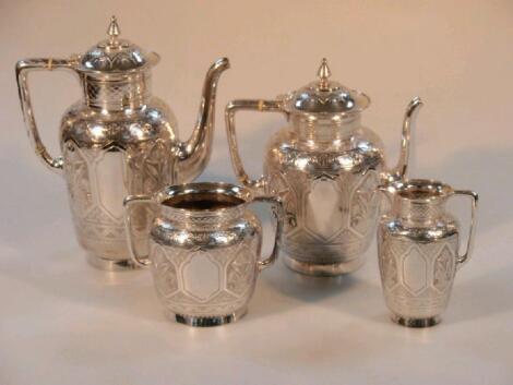 A Victorian silver aesthetic period four piece tea and coffee service by John Round