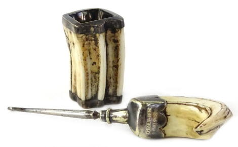 A Victorian warthog tusk, hollowed out and mounted in white coloured metal, engraved to the underside 'Harry Longstaff, May 1882', and a similar button hook with plated mount stamped 'G Walior, 1903, Roland Ward, Piccadilly, etc. (2).