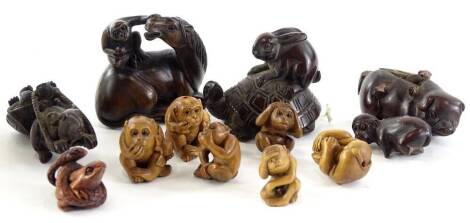 A collection of carved wooden netsukes, to include a rat and tortoise, monkey and horse, rabbit and tortoise, small carved monkey beads, etc.