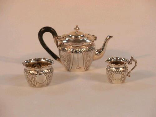 A late Victorian/early Edward VII silver three-piece bachelors tea service