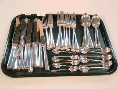 A composite suite of George V/George VI silver cutlery and flat ware