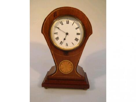 An early 20thC mahogany cased mantel timepiece