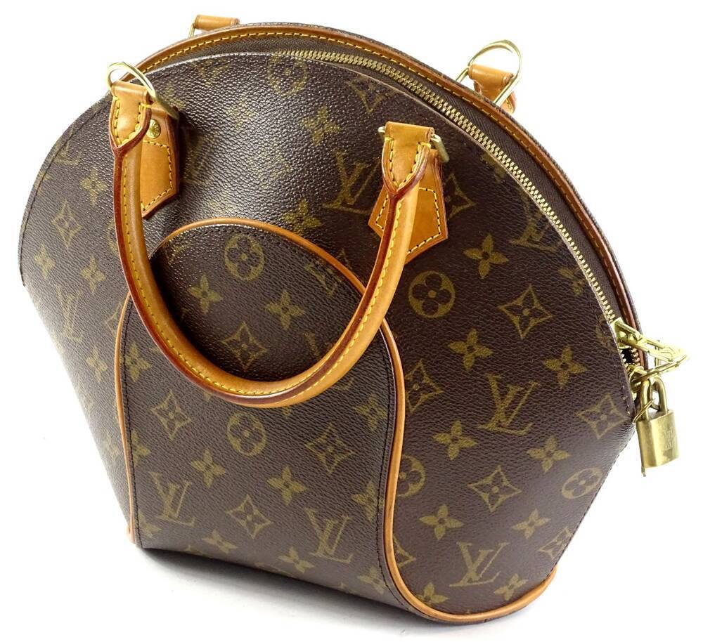 A Louis Vuitton monogram Ellipse pm handbag, with cow hide trim, with brass  hardware, padlock and