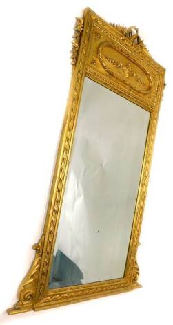 A 19thC gilt gesso narrow overmantel mirror, with a ribbon and a flower crest above a frieze decorated with basket of flowers, issuing further flowers, within an oval cartouche, above a rectangular bevelled plate, flanked by foliate scrolls to the base, 1