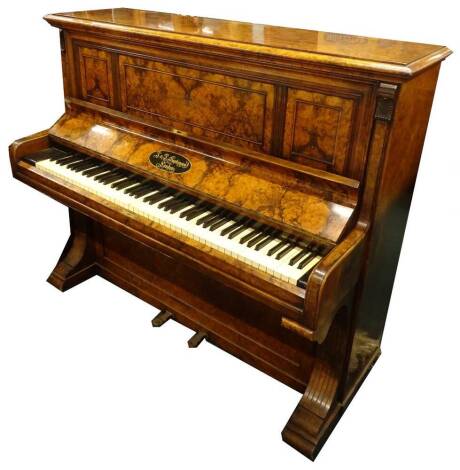 A late Victorian burr walnut upright piano by J & J Hopkinson London, with ivory keys, also stamped Wilson, Peck & Co., 142cm W.