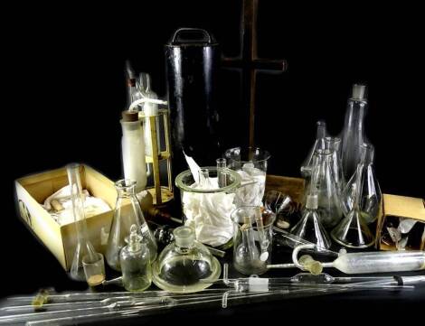 Various pieces of laboratory equipment, to include taps, bottles, etc.