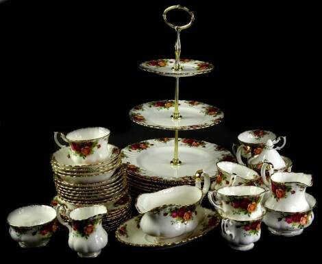 A Royal Albert Old Country Roses pattern part tea and dinner service, to include dinner plates, three tier cake stand, etc.