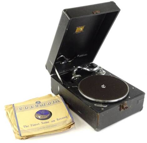 A HMV portable gramophone, in black canvas case and various 78 records.