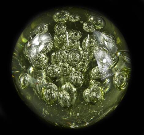 A large globular glass paperweight with bubble inclusions, 16cm Dia.