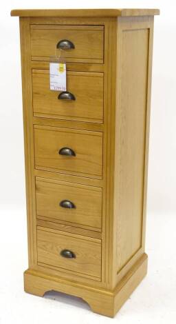 An ex shop display Hampton Court oak narrow chest or tall boy, with five drawers on bracket feet, 126cm H, 47cm W, retail price was £399.99 reduced to £299.99.