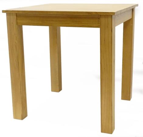 An ex shop display square natural oak kitchen table, the top 75cm x 75cm.