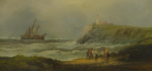 19thC British School. Coastal scene with figures on the shore, two masted ship in choppy waters and lighthouse on the head, oil on canvas, 22cm x 37cm.