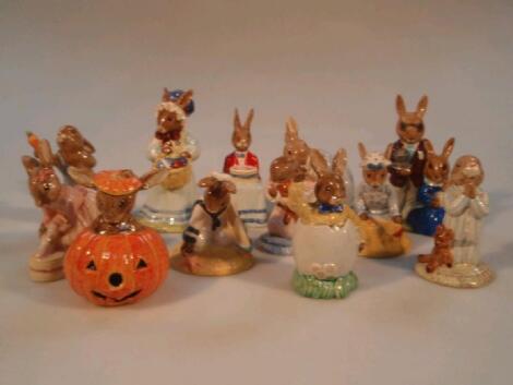 A collection of 12 Royal Doulton Bunnykins figures