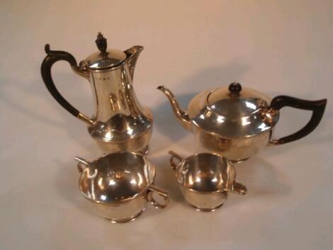 A George V silver matched four piece tea service