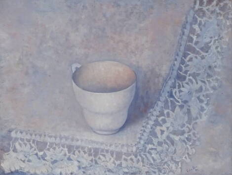 Julie Elizabeth Bell (20thC). Cup and lace, oil on board, signed and dated (19)84, 19cm x 24cm. Label verso Royal Academy Summer Exhibition 1985.