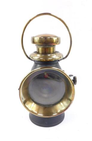 A brass and black painted Lucas 'King Of The Road' side lamp, No 726, with brass loop handle, 26.5cm H. We have instructions from the vendor to sell without reserve.