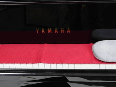 A Yamaha Baby Grand piano, in black with adjustable music rest, no. KJ 2737432 GB1 stamped Yamaha Corporation, 145cm W, 157cm D. - 3