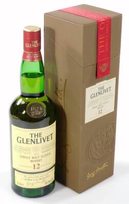 A bottle of Glenlivet 12 Year Old single malt Scotch whisky, 70cl. (in paper wrapper and outer box)