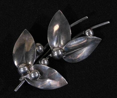 A modern Danish silver brooch, in the form of leaves and berries, marked to rear Sterling Denmark N.E. From, 925 S, 6cm high, 7.2g.