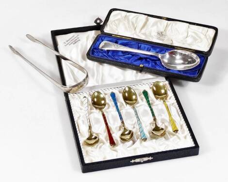 Various silver, etc. a cased set of six sterling silver gilt and enamel bean spoons, in varying colours, 9cm W, a cased Edwardian spoon London 1904, a pair of sugar bows, 3½oz. (a quantity, with two cases)