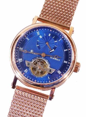 A gentleman's Constantin Weisz fashion watch, with 5cm Dia. dial, fixed bezel, Roman numeric numerals, subsidiary dial and open movement, on a blue ground, with gilt metal mesh work bracelet.