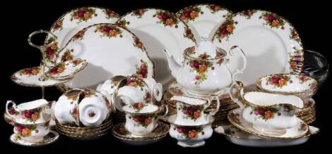 A comprehensive Royal Albert Old Country Roses part service, to include cakestand, dinner plates, 26cm W, side plates, bread and butter plates, cups, saucers, gravy boat, serving dish, other pieces, printed marks beneath and a moulded glass bowl with pla