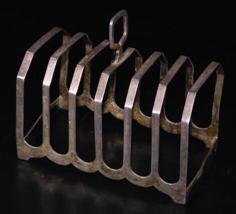 A George VI silver toast rack, with six sections and shaped handle, on angular feet, Birmingham 1938, 10cm H, 3½ oz.