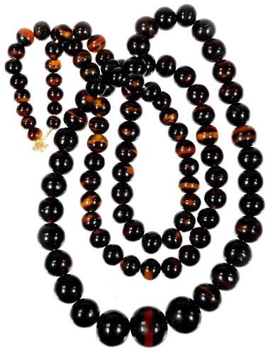 A tiger's eye graduated bead necklace, with spherical beads, the smallest 4mm wide, the largest 12mm wide, on a string necklace, 37cm long, 38.8g all in.